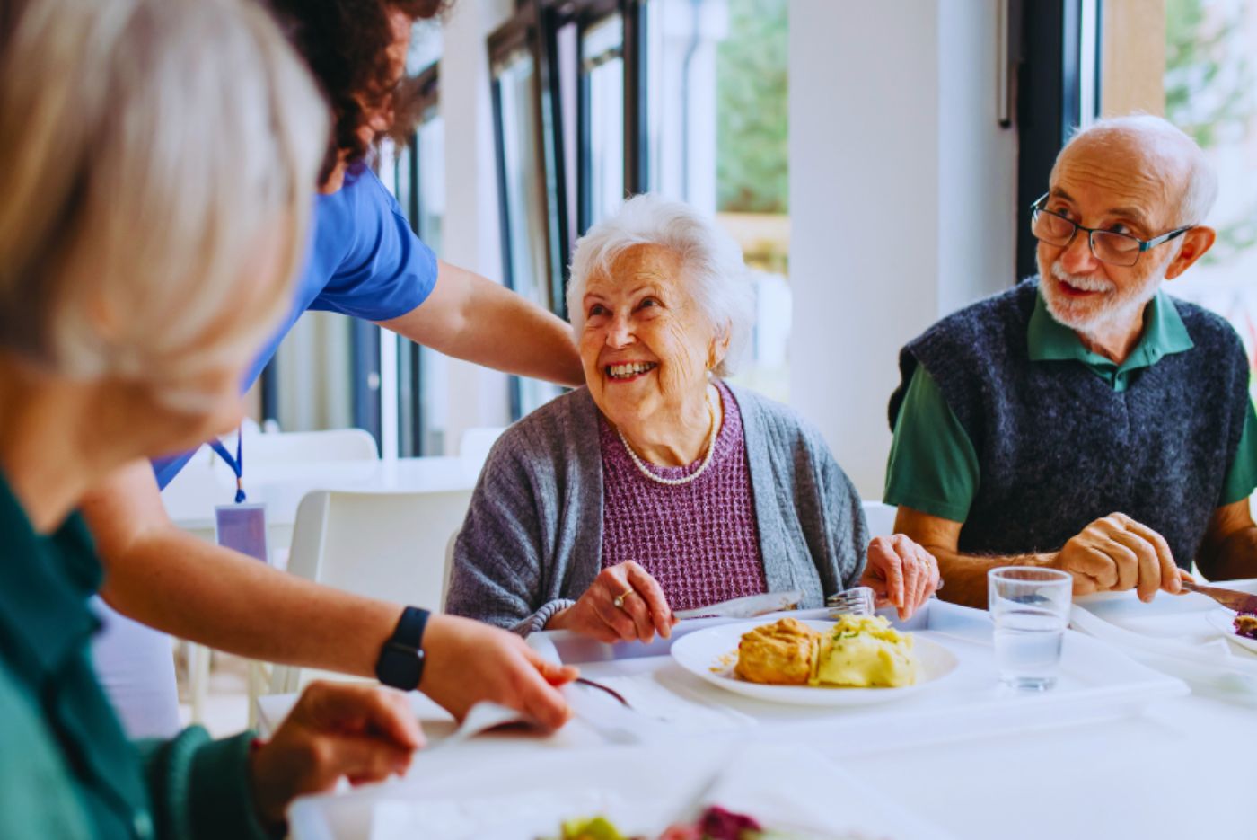 elderly couple eating