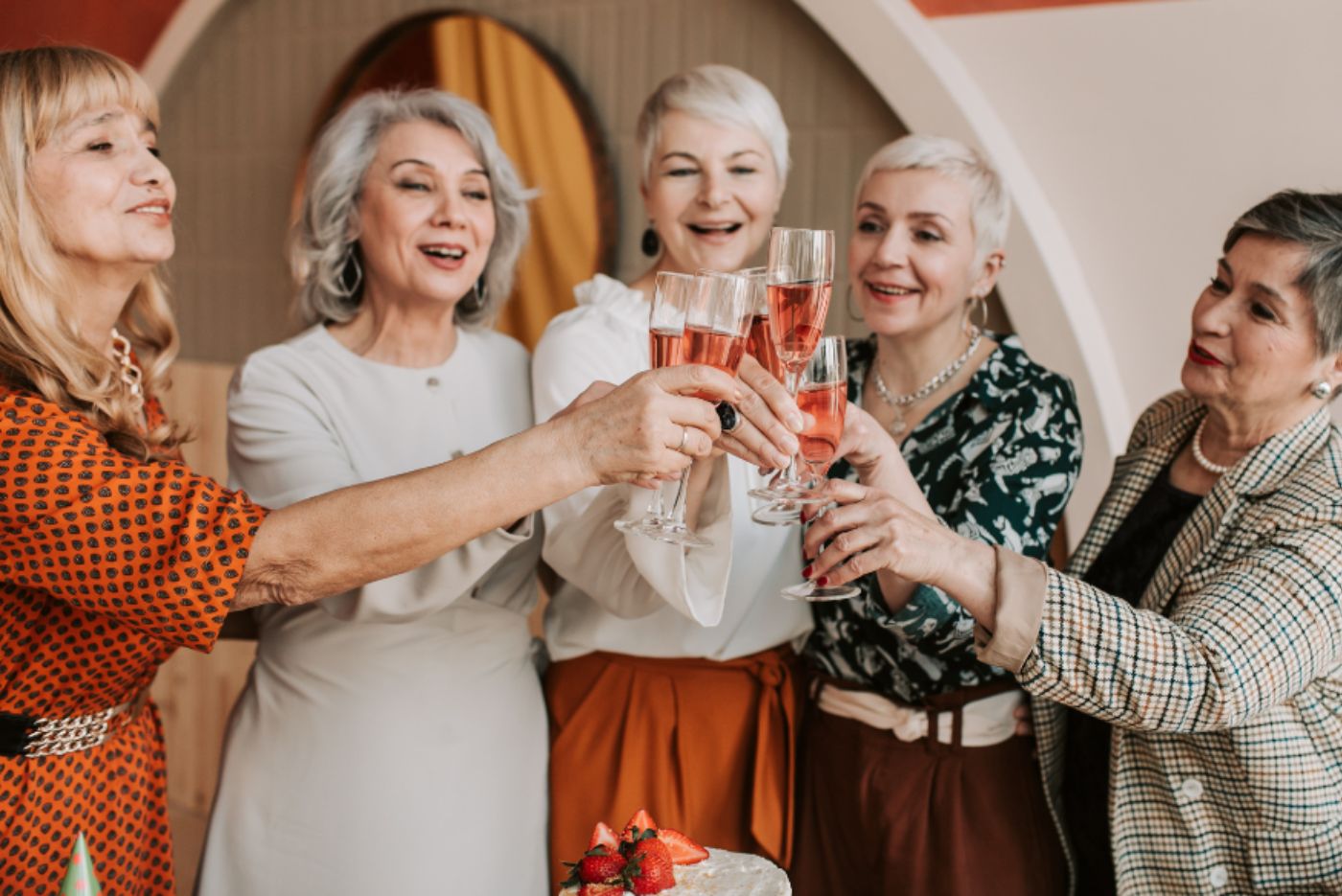 Friends clinking glasses in celebration
